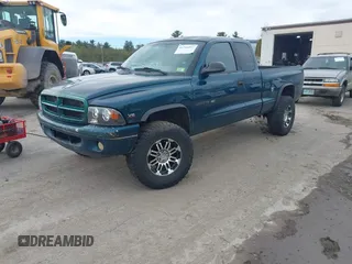 1998 Dodge Dakota SLT with VIN 1B7GG22XXWS625292, listed as a IAAI auction lot 41704917 with 158,629 mi miles and . Bid and sale history available at carsss.com. Image 2.