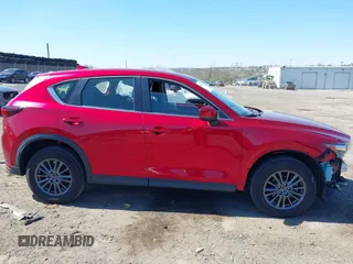 2019 Mazda CX-5 Sport with VIN JM3KFBBM6K1596402, listed as a IAAI auction lot 41971766 with 60,396 mi miles and . Bid and sale history available at DreamBid. Image 14.