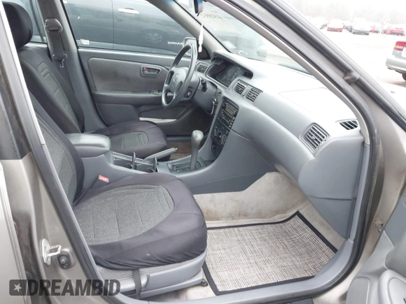 2001 Toyota Camry CE with VIN 4T1BG22K81U099347, listed as a IAAI auction lot 41920932 with 185,186 mi miles and . Bid and sale history available at DreamBid. Image 5.