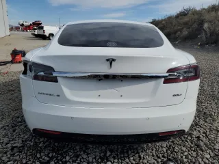 2016 Tesla Model S 90D with VIN 5YJSA1E27GF142380, listed as a Copart auction lot 50661905 with 104,865 mi miles and Salvage Title. Bid and sale history available at DreamBid. Image 6.