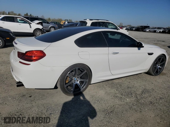 2014 BMW M6 z VIN WBSLX9C51ED160143, wystawiony jako Copart lot #50762185 z przebiegiem 91 718 mil mil oraz Szkody całkowita. Historia ofert i sprzedaży dostępna na DreamBid. Obrazek 3.