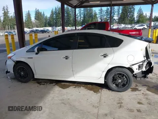 2012 Toyota Prius One z VIN JTDKN3DU8C5512220, wystawiony jako IAAI lot #41806290 z przebiegiem 204 205 mil mil oraz . Historia ofert i sprzedaży dostępna na DreamBid. Obrazek 14.