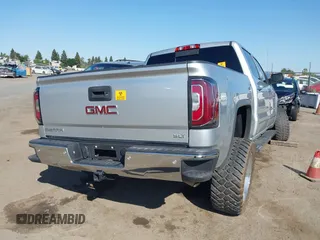 2018 GMC Sierra 1500 SLT with VIN 3GTP1NEC2JG528387, listed as a IAAI auction lot 42598955 with Not provided miles and . Bid and sale history available at DreamBid. Image 4.