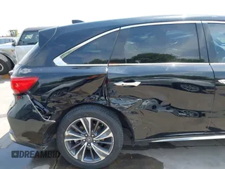 2019 Acura MDX Technology z VIN 5J8YD3H51KL000634, wystawiony jako IAAI lot #42056934 z przebiegiem 103 411 mil mil oraz . Historia ofert i sprzedaży dostępna na DreamBid. Obrazek 18.