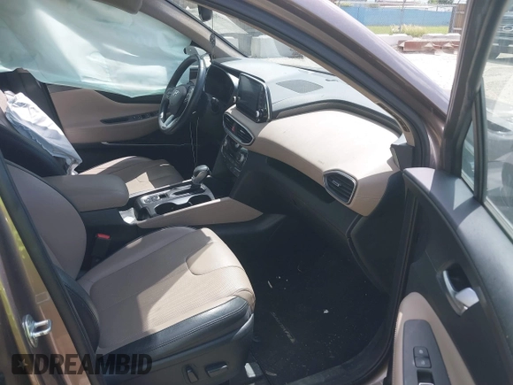 2020 Hyundai Santa Fe Limited with VIN 5NMS53AA5LH191809, listed as a IAAI auction lot 39804008 with 115,775 mi miles and . Bid and sale history available at DreamBid. Image 5.