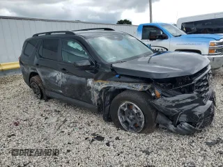 2024 Honda Pilot TrailSport with VIN 5FNYG1H61RB041362, listed as a Copart auction lot 67920164 with 5,511 mi miles and Salvage Title. Bid and sale history available at carsss.com. Image 4.