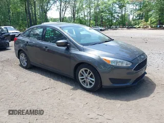 2018 Ford Focus SE z VIN 1FADP3F23JL251138, wystawiony jako IAAI lot #42173470 z przebiegiem 108 206 mil mil oraz . Historia ofert i sprzedaży dostępna na DreamBid. Obrazek 1.