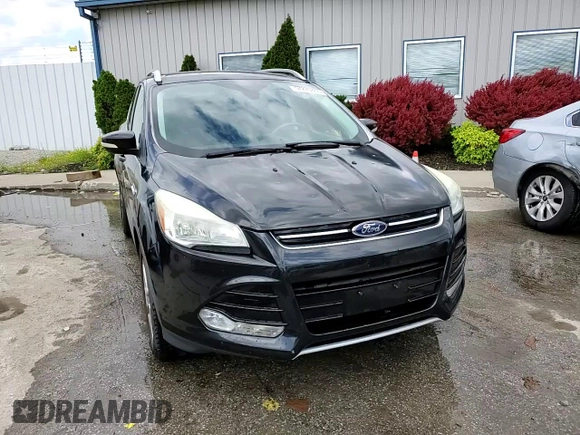 2015 Ford Escape Titanium with VIN 1FMCU0JX5FUA24210, listed as a Copart auction lot 57270855 with 115,613 mi miles and Salvage title. Bid and sale history available at DreamBid. Image 14.