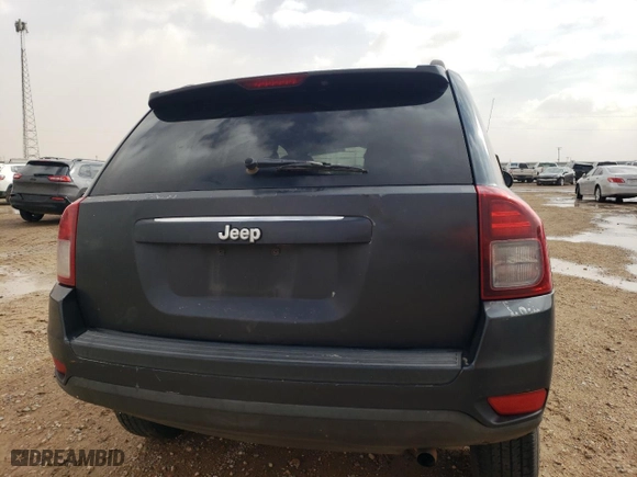 2014 Jeep Compass Sport with VIN 1C4NJCBA6ED573849, listed as a Copart auction lot 47001505 with 259,846 mi miles and Salvage Title. Bid and sale history available at carsss.com. Image 6.