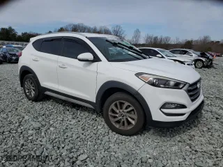 2017 Hyundai Tucson SE Plus with VIN KM8J33A4XHU420492, listed as a Copart auction lot 46785295 with 104,844 mi miles and Salvage Title. Bid and sale history available at carsss.com. Image 4.