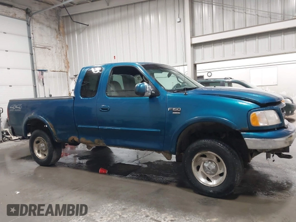 2000 Ford F-150 XL z VIN 1FTRX18L7YKB27657, wystawiony jako IAAI lot #42262373 z przebiegiem Nie podano mil oraz . Historia ofert i sprzedaży dostępna na DreamBid. Obrazek 13.