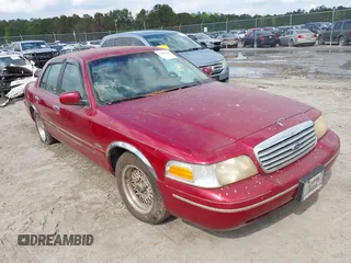 1998 Ford Crown Victoria LX с VIN 2FAFP74W4WX141814, выставлен на аукционе IAAI как лот 41999302 с пробегом 163 397 миль миль и . История ставок и продаж доступна на DreamBid. Изображение 1.