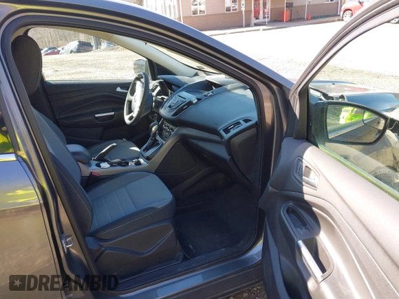 2014 Ford Escape SE z VIN 1FMCU0G99EUB25967, wystawiony jako IAAI lot #41805970 z przebiegiem 72 770 mil mil oraz . Historia ofert i sprzedaży dostępna na DreamBid. Obrazek 5.