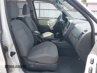 2006 Ford Escape XLT with VIN 1FMCU93106KA36063, listed as a IAAI auction lot 42610043 with 193,703 mi miles and . Bid and sale history available at DreamBid. Image 5.