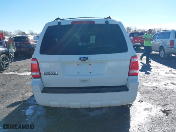 2010 Ford Escape XLT with VIN 1FMCU0D72AKC62810, listed as a IAAI auction lot 41343848 with 227,622 mi miles. Bid and sale history available at carsss.com. Image 16.