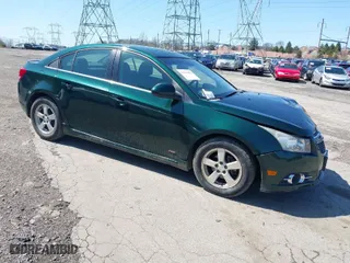 2014 Chevrolet Cruze 1LT with VIN 1G1PC5SB5E7187521, listed as a IAAI auction lot 41914482 with 149,217 mi miles. Bid and sale history available at carsss.com. Image 1.