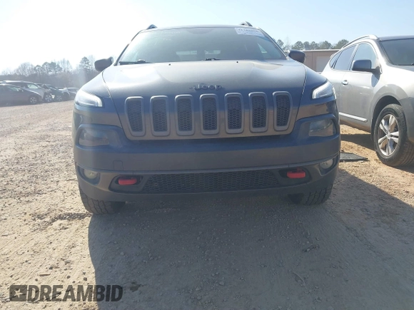 2014 Jeep Cherokee Trailhawk with VIN 1C4PJMBS6EW278987, listed as a IAAI auction lot 41789868 with 136,696 mi miles. Bid and sale history available at carsss.com. Image 6.