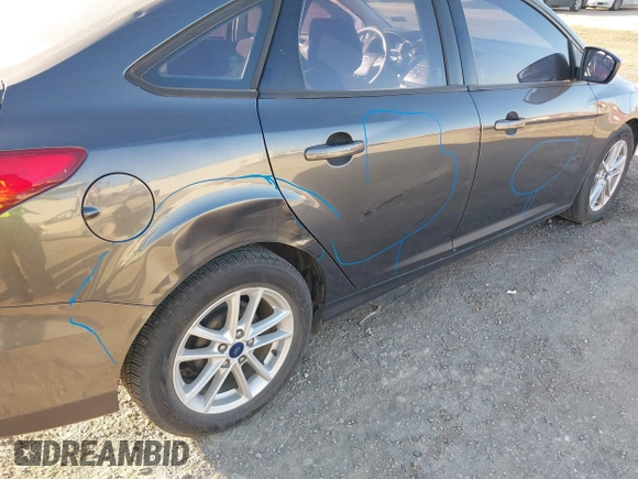 2018 Ford Focus SE with VIN 1FADP3F20JL216525, listed as a IAAI auction lot 41744383 with 92,385 mi miles. Bid and sale history available at carsss.com. Image 6.