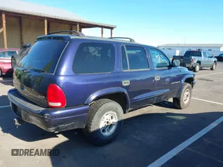 1999 Dodge Durango z VIN 1B4HS28Z9XF536719, wystawiony jako IAAI lot #42641014 z przebiegiem 321 697 mil mil oraz . Historia ofert i sprzedaży dostępna na DreamBid. Obrazek 4.