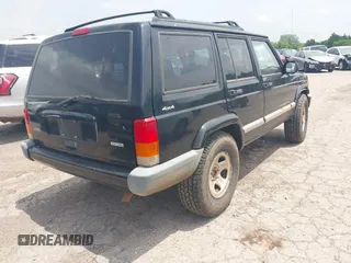 2001 Jeep Cherokee Sport with VIN 1J4FF48S31L601063, listed as a IAAI auction lot 42302200 with 251,308 mi miles and . Bid and sale history available at DreamBid. Image 4.
