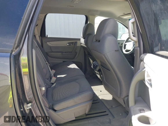 2015 Chevrolet Traverse LS z VIN 1GNKVFED4FJ323888, wystawiony jako IAAI lot #42001827 z przebiegiem 182 819 mil mil oraz . Historia ofert i sprzedaży dostępna na DreamBid. Obrazek 8.