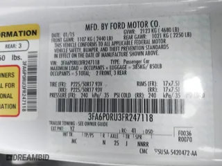 2015 Ford Fusion Titanium Hybrid with VIN 3FA6P0RU3FR247118, listed as a IAAI auction lot 41210219 with 143,348 mi miles. Bid and sale history available at carsss.com. Image 9.