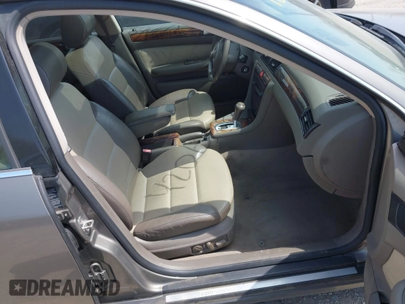 2004 Audi allroad A6 V8 with VIN WA1YD64B94N091052, listed as a IAAI auction lot 42069786 with 214,042 mi miles and . Bid and sale history available at DreamBid. Image 5.