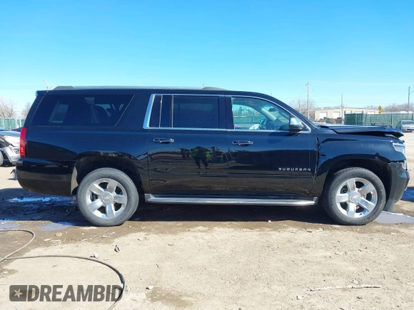 2018 Chevrolet Suburban Premier z VIN 1GNSCJKC5JR386545, wystawiony jako IAAI lot #41684349 z przebiegiem 130 511 mil mil oraz . Historia ofert i sprzedaży dostępna na DreamBid. Obrazek 13.