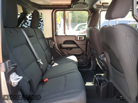 2018 Jeep Wrangler Unlimited Sahara with VIN 1C4HJXEGXJW229881, listed as a Copart auction lot 58762775 with 82,470 mi miles and Salvage title. Bid and sale history available at DreamBid. Image 11.