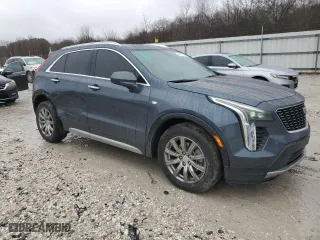 2020 Cadillac XT4 FWD Premium Luxury with VIN 1GYFZCR48LF043018, listed as a Copart auction lot 45097125 with 84,567 mi miles and Salvage Title. Bid and sale history available at carsss.com. Image 4.