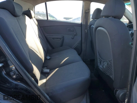 2009 Kia Rio LX with VIN KNADE243796516902, listed as a Copart auction lot 86567394 with 304,684 mi miles and Salvage Title. Bid and sale history available at carsss.com. Image 10.