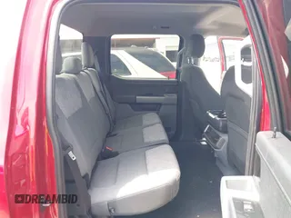 2023 Ford F-150 Lightning Pro with VIN 1FTVW1EL8PWG33656, listed as a IAAI auction lot 42260659 with 22,490 mi miles and . Bid and sale history available at DreamBid. Image 8.