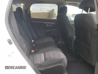 2020 Honda CR-V EX z VIN 2HKRW2H59LH673264, wystawiony jako Copart lot #56910865 z przebiegiem 93 994 mil mil oraz Szkoda całkowita • Salvage title. Historia ofert i sprzedaży dostępna na DreamBid. Obrazek 11.