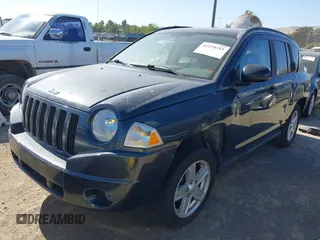 2007 Jeep Compass Sport with VIN 1J8FF47W27D110618, listed as a IAAI auction lot 42195311 with 135,128 mi miles and . Bid and sale history available at carsss.com. Image 2.
