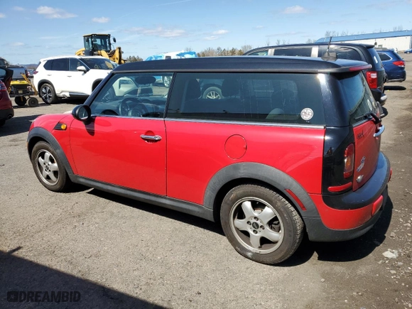 2010 MINI Cooper Clubman with VIN WMWML3C52ATX51812, listed as a Copart auction lot 51457635 with 84,719 mi miles and Salvage Title. Bid and sale history available at carsss.com. Image 2.