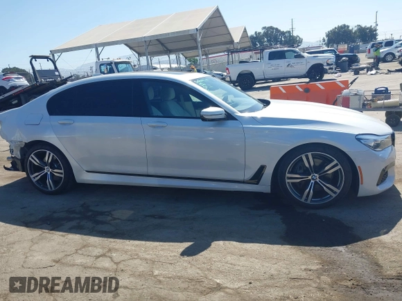 2019 BMW 7 Series 740i with VIN WBA7E2C53KB454816, listed as a IAAI auction lot 42539294 with 73,363 mi miles and . Bid and sale history available at DreamBid. Image 14.