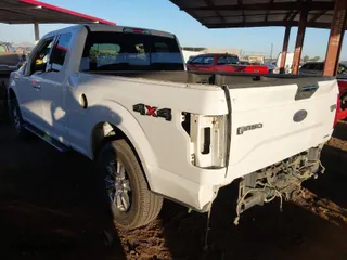 2015 Ford F-150 XLT with VIN 1FTEX1E87FFD13249, listed as a IAAI auction lot 41214373 with 66,076 mi miles. Bid and sale history available at carsss.com. Image 3.