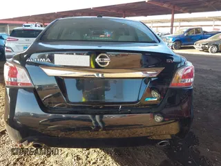2014 Nissan Altima SL with VIN 1N4AL3AP7EC403087, listed as a IAAI auction lot 40977621 with 141,728 mi miles and . Bid and sale history available at DreamBid. Image 16.