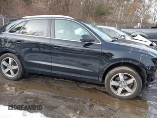 2015 Audi Q3 Premium Plus with VIN WA1EFCFS5FR008723, listed as a IAAI auction lot 41472323 with 112,709 mi miles and . Bid and sale history available at DreamBid. Image 13.