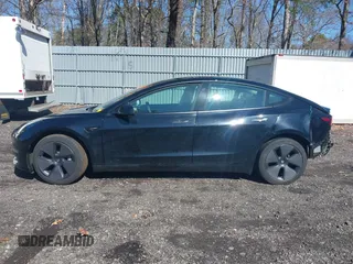 2023 Tesla Model 3 Long Range with VIN 5YJ3E1EB1PF392027, listed as a IAAI auction lot 41983638 with 31,415 mi miles and . Bid and sale history available at DreamBid. Image 13.