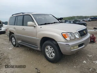1999 Lexus LX 470 with VIN JT6HT00W2X0043805, listed as a Copart auction lot 54496735 with 520,244 mi miles and Clean Title. Bid and sale history available at DreamBid. Image 4.