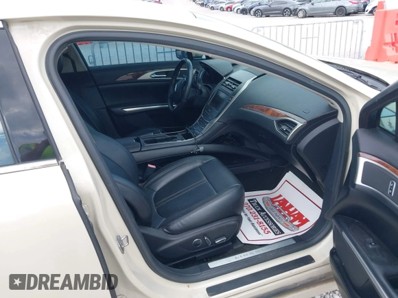 2016 Lincoln MKZ with VIN 3LN6L2J91GR624583, listed as a IAAI auction lot 42113321 with 126,592 mi miles and . Bid and sale history available at DreamBid. Image 5.