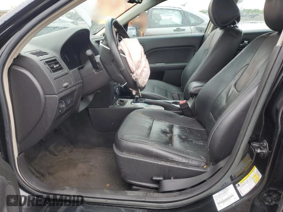 2012 Ford Fusion SEL z VIN 3FAHP0JA1CR393751, wystawiony jako Copart lot #58041345 z przebiegiem 103 092 mil mil oraz Tytuł czysty. Historia ofert i sprzedaży dostępna na DreamBid. Obrazek 7.