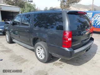 2012 Chevrolet Suburban LT with VIN 1GNSCJE0XCR257186, listed as a IAAI auction lot 41597580 with 174,284 mi miles. Bid and sale history available at carsss.com. Image 3.