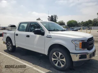 2019 Ford F-150 XL with VIN 1FTEW1E49KFB03911, listed as a Copart auction lot 60873085 with 143,134 mi miles and Clean title. Bid and sale history available at DreamBid. Image 4.
