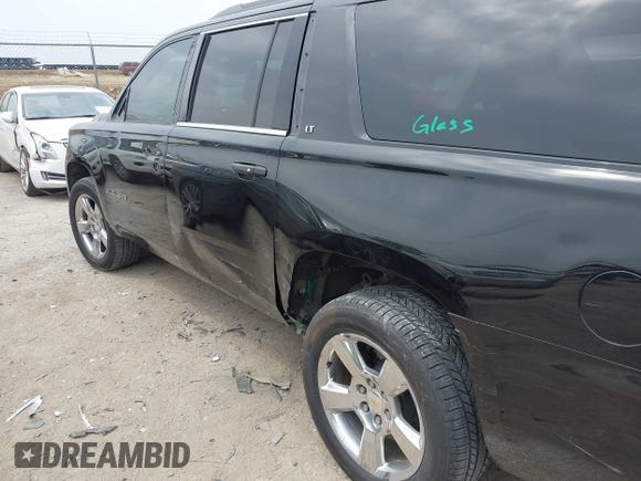 2015 Chevrolet Suburban LT with VIN 1GNSCJKC1FR304656, listed as a IAAI auction lot 42071124 with 133,140 mi miles. Bid and sale history available at carsss.com. Image 6.