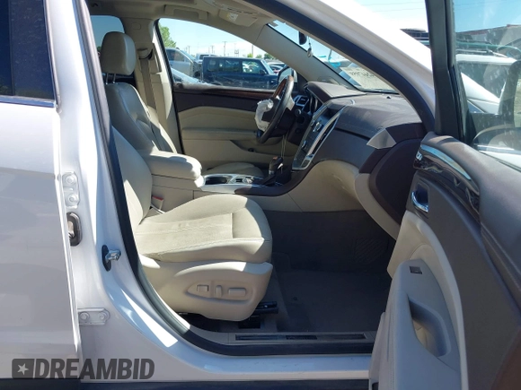 2011 Cadillac SRX Turbo Premium Collection with VIN 3GYFNKE68BS532056, listed as a IAAI auction lot 42447059 with 104,969 mi miles and . Bid and sale history available at DreamBid. Image 5.