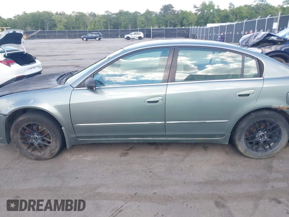 2006 Nissan Altima S with VIN 1N4AL11D26N308663, listed as a IAAI auction lot 42187337 with 202,069 mi miles and . Bid and sale history available at DreamBid. Image 14.