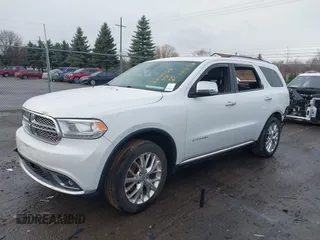 2014 Dodge Durango Citadel with VIN 1C4RDJEG0EC476018, listed as a IAAI auction lot 41212456 with 154,929 mi miles and . Bid and sale history available at DreamBid. Image 17.