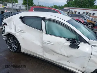 2023 Mazda 3 S Select with VIN JM1BPAKM9P1604211, listed as a IAAI auction lot 42093424 with Not provided miles and . Bid and sale history available at DreamBid. Image 14.